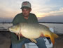 Mike Wheeler (peg 8) with a 24.3 lb common carp.