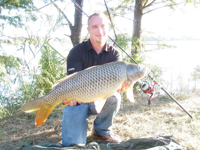 Kurt Bond with a 22.14 lb common caught during Session 6 of the Wild Carp Club of Austin, TX