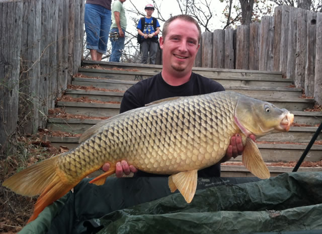 Kurt Bond with a new USA personal best common, a 30.4 lb beauty caught during Session 8 of the Wild Carp Club of Austin, held at Lady Bird Lake, TX