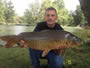 Chris West with a 20.5 lb common caught during Session 2.