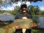 Pat Anderson with a 23.1 lb common caught during Session 2 of the Fall '12 season I the Wild Carp Club of Central NY.