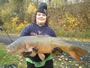 Nathaniel holding Don Knowles' 24.15 lb common caught during Session 6 of the Wild Carp Club of Central NY.