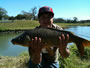 Loren Hernandez with an 11 lb common carp caught during session 2 of the Wild Carp Club of Houston, TX