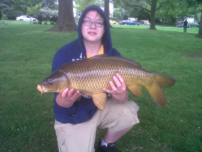Zach Randlett with a 14.2 lb common--the only fish caught during Session 1 of the 2012 season of the Wild Carp Club of New England