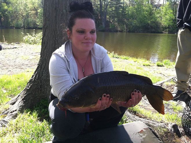 Michelle Moloney with a common carp caught during session 1 of the Wild Carp Club of New England