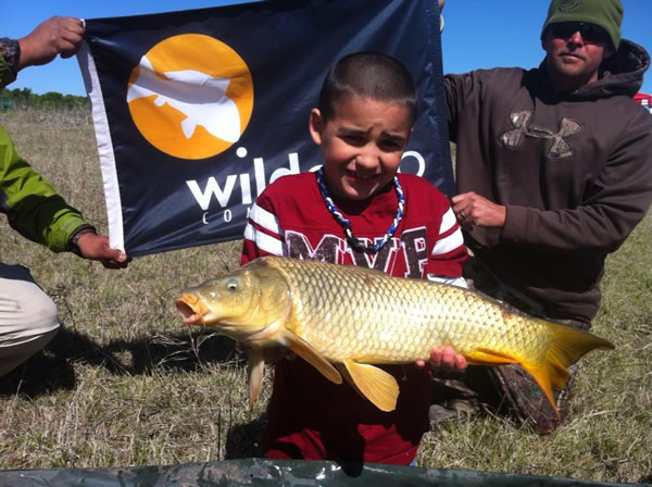 Ricky Wilson III with a 6 lb, 10 oz common caught during session 2 of the 2013 season of the Wild Carp Club of North Texas.