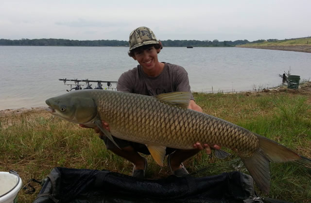 Austin Anderson with a 25.8 lb grass carp caught during session 5 of the Wild Carp Club of North Texas