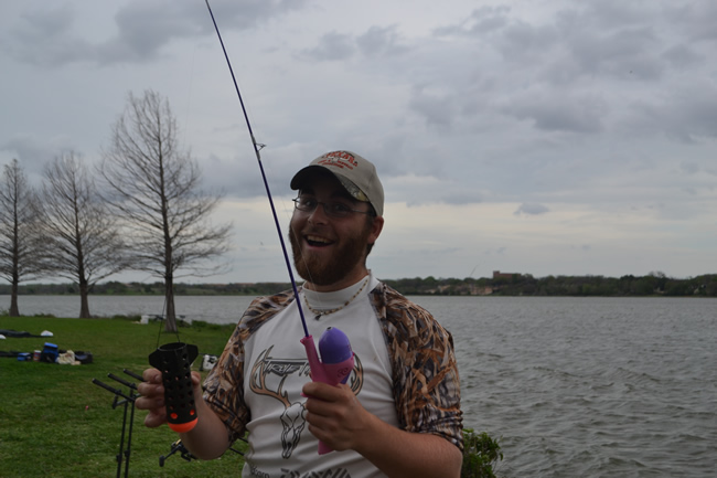 Ryan Daniel displays his new spod rod during Session 2 of the Wild Carp Club of North Texas
