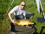 Jason Tomlinson with the fist carp ever caught for the Wild Carp Club of Quebec!