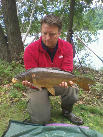 Dean Brooks with his second catch of the day, a 6 lb, 9 oz mirror carp