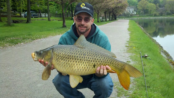 Scott Osmond with a 20 lb, 12 oz common caught during session 2 of Wild Carp Club of New England