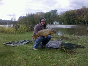 Josh Carnright with a 19 lb, 8 oz Common during Session 5 of Wild Carp Club