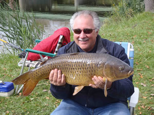Newcomer Frank Fava poses with his 17 lb, 7 oz Common caught during Session 5 of Wild Carp Club