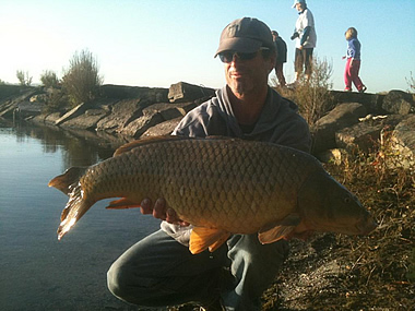 Paul Russell with a 25.0 lb common caught during Session 5 of the Wild Carp Club of Central NY. Liverpool, NY