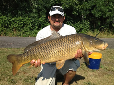 Tamas Vegvari with a 17.1 lb common from the July 8, 2012 CNY Shootout event in Fulton, NY.