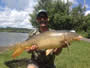 Pat Anderson with a 20.11 lb common caught during hour 4 of the August 3 CNY Shootout in Fulton, NY.
