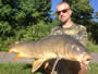 Rick Greenier with a 21.14 lb common that he caught to win hour 9 of the August 3 CNY Shootout in Fulton, NY.