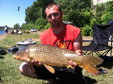 Steve Bailey with a 16 lb, 14 oz common caught during the July 9 Shootout in Fulton, NY