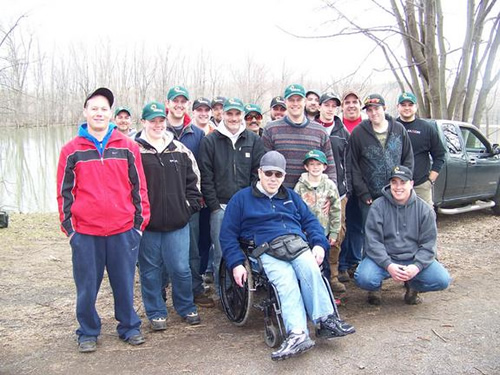 Wild Carp Club members gathered along the Seneca River in Community Park