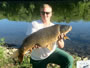 Ian Hawkins (peg 10) with a 27.7 lb common caught during the '12 Wild Carp Classic in Baldwinsville, NY, USA.