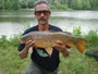Pat Anderson with a 9.2 lb mirror carp caught during the Big Carp Challenge.