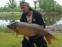Bogdan Bucur with the hour 2 winner--a 30.4 lb common.