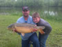 Greg Conger with a 16.9 lb mirror carp caught during hour two of the Big Carp Challenge.