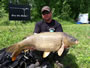 Chris Jackson with a 27.2 lb common caught during hour 4 of the big carp challenge.