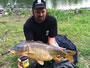 Tamas Vegvari with a 21.6 lb common from hour 3 of the Big Carp Challenge.