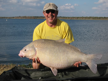 Keith Thompson with one of the several huge smallmouth buffalo he has captured in Texas waters