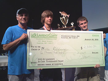 Michael Cummings receives his $2,300 check for winning the 2011 St. Lawrence Jr. Carp Tournament