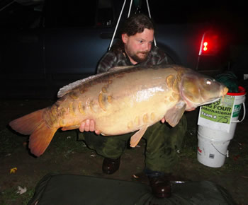 WCC of New England Director Robert Duprey with a 40+ lb mirror carp